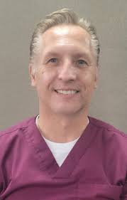 Hello everyone! I'm Dr. David Maklan, a dedicated chiropractor serving the  Tri-County area since 1994. Myself and my team are fluent in English,  Spanish, and Portuguese, ensuring that everyone in our diverse