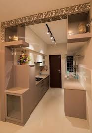 The Light Shades For The Cabinets In This Modern Kitchen Are Accentuated By The Intricate De Kitchen Furniture Design Kitchen Room Design Modern Kitchen Design
