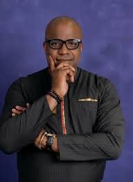 This man walks into a bar, (santa fe) and all the attention is directed towards him. Ubong King Wikipedia