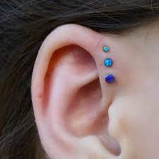 Ashley Mcelvy On Instagram I Didn T Get To Poke This Angel But I Did Get To Upgrade Her Tripl Forward Helix Piercing Triple Forward Helix Ear Piercings Helix