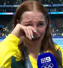 See why Mollie O'Callaghan broke down in uncontrollable tears after her mum  dropped an emotional bombshell after star's gold medal win