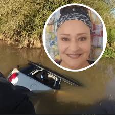 Woman saved from sinking car says 'I'd given up hope' as brave police  honoured