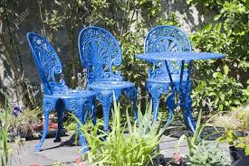 Maybe you would like to learn more about one of these? A Horizontal Image Of Blue Painted Wrought Iron Garden Furniture Stock Photo Picture And Royalty Free Image Image 7110126
