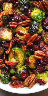 Christmas is a deeply special time for people all over the word. Christmas Side Dish Brussels Sprouts Bacon Pecans And Cranberries Roasted Vegetable Recipes Veggie Dishes Vegetable Dishes