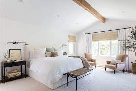 The black drapes add drama. 7 Ways To Decorate With White