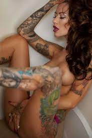 Nude babes with tattoos