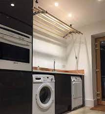 The wall mounted indoor laundry rack clothes airer dryer. The Six 6 Lath Wooden Pulley Clothes Airer Clothesmaid