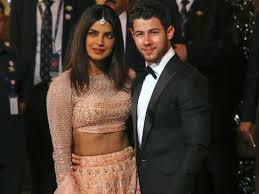 What Priyanka Chopra and Nick Jonas wore to Isha Ambani's wedding - Insider