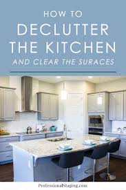 The whole point of a kitchen is consuming food, so it makes sense that you've got a lot of consumables in cabinets or a pantry. How To Declutter Your Kitchen And Clear The Surfaces Mhm Professional Staging