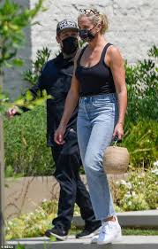 He is the lead guitarist and backing vocalist for the band g. Cameron Diaz Looks Relaxed In A Black Vest And High Slung Jeans Readsector