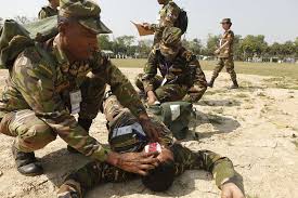 Bangladesh Army soldiers practice giving medical aid