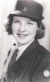 Self supporting Village: Life in Hovingham, Yorkshire ,October 1942. Land  Girl Dorothy Sills (aged 19) from Middlesborough helps with the harvest