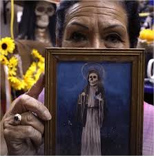 The people who worship santa muerte are. Death Is Women S Work Santa Muerte A Folk Saint And Her Female Followers Springerlink
