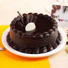 Ranging from delectable chocolate truffle to creamy vanilla, we have a wide range of yummy cakes that you can order online for your dear ones in canada.</p> Buy Send Chocolate Truffle Delicious Cake Half Kg Online Winni Winni In