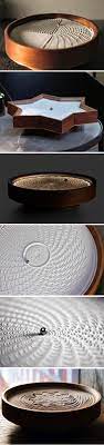 This Tabletop Device S Kinetic Sand Paintings Are The Perfect Blend Of Art And Algorithm Kinetic Sculpture Sand Painting Metal Ball