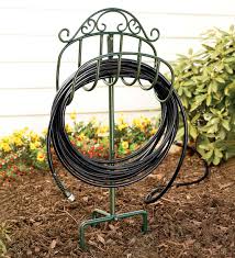 Check out our garden hose storage selection for the very best in unique or custom, handmade well you're in luck, because here they come. Wrought Iron Hose Holder With Ground Stake Green Plowhearth