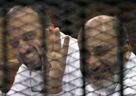 Image result for ‫صور البلتاجى وحجازى بملابس السجن‬‎