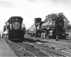 Ndem 1571 2 8 0 Consolidation Type A Brand New Emd G7 Is Being Refueled While The Steam Engine Is Ready To Couple Estacion De Ferrocarriles Tren Locomotora
