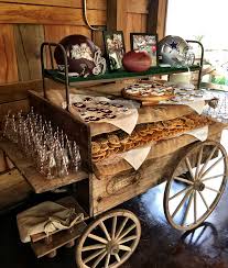 Grooms Cake Table At The Hideaway Mississippi State And Dallas Cowboy Cookies And Milk Grooms Cake Tables Grooms Table Rustic Groom