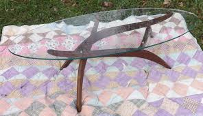 Danish modern surfboard coffee table in teak $ 1,850. Mid Century Coffee Table With A Surfboard Glass Top And Teak Bottom Collectors Weekly