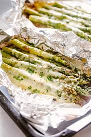 Cheesy Grilled Asparagus In Foil Packs Cheesy Deliciously Tender Asparagus Loaded With C Grilled Asparagus Grilled Asparagus Recipes Grill Asparagus In Foil