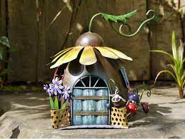 Diy fairy house lamp using coke plastic bottles in this tutorial i show you how i made a fairy house lamp using coca cola plastic bottles ! Fairy House With Sunflower Roof And Opening Front Door