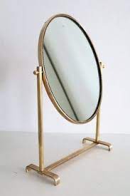 Beautiful circular pattern frame, with many small details symmetrically arranged around the perimeter. 230 M I R R O R Ideas In 2021 Mirror Mirror Wall Mirror Table