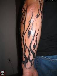 Tribal Black Ink Fire And Flame Tattoo On Man Sleeve Flame Tattoos Arm Tattoos For Guys Fire Tattoo
