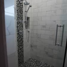 Video showing the detail of the white marble large shower panels. Lusso Carrara Marble Tile Qdi Surfaces