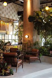 Custom Designed Furniture At Devocion Coffee Shop In Brooklyn New York Shopfurniture Coffee Shop Interior Design Cafe Interior Design Coffee Shop Furniture