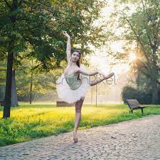 I wanna dance like that but i no longer can. Young Beautiful Ballerina Dancing Outdoors In A Park Ballerina Stock Photo Crushpixel