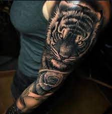 Tiger Tattoos On Upper Arm Tiger Tattoo Sleeve Tiger Tattoo Arm Tattoos For Guys