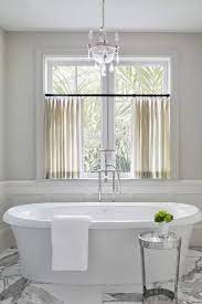 Double slipper freestanding tub maximizes comfort while emphasizing convenience. What I Love Wednesday Knowles Design Studio South Shore Decorating Blog Traditional Bathroom Traditional Bathroom Vanity Bathroom Interior Design