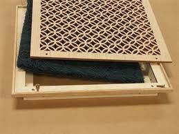 We looked around for floor air vent covers we could buy to solve our problem, but the only ones we could find that would remotely work were plastic and we made these to fit over the standard 4 x 10 inch and 4 x 14 inch floor air vent registers. Replace You Metal Return Grills With Decorative Wood Grills This Company Makes Both The Grills And The Box T Vent Covers Diy Decorative Vent Cover Air Return