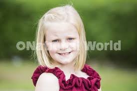 39535851-Charlie Bell, eight, who cut her hair for charity, with brothers Colton  Bell, three, and Connor Bell, 10.