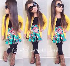 Black And Yellow Outfits For Kids Black Tank Yellow Cardi Floral Skirt Black Leggings Boots Little Girl Fashion Little Girl Outfits Designer Kids Clothes