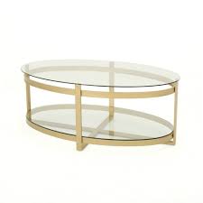 Glass or acrylic stays in the background to let your rugs or accent chairs be the center of attention. Plumeria Modern Iron With Tempered Glass Coffee Table Brass Christopher Knight Home Target