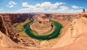 It can be accessed from state route 24 via 30 miles (48 km) of graded dirt road, or from green river via 47 miles (76 km) of dirt road. Horseshoe Bend Arizona Wikipedia