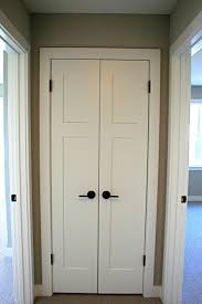 Pantry cabinet in vanilla white French Doors Are An Option You Don T See Very Often Louvered Or Pocket Doors Hiding Laundry Fac White Interior Doors French Closet Doors Double Doors Interior