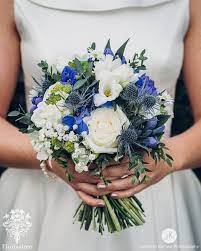 Awesome A Dainty Rustic Bridal Bouquet Of White Avalanche Roses White Freesia White G Blue Wedding Bouquet Bridal Bouquet Blue Rustic Bridal Bouquets