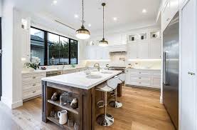 The dark hardwood floors blend well with the other deep and rich features. 50 High End Dark Wood Kitchens Photos Designing Idea
