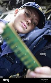 BLACK SEA — Petty Officer 3rd Class Alenia Rios of the Legend-class  national security cutter USCGC Hamilton (WMSL 753) salutes the Bulgarian  corvette Bodri (BGS 14) in the Black Sea, May 13,