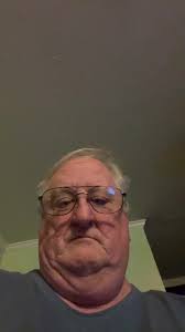 Close-Up of Individual in Blue Top