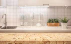 Background with wooden table and grunge blue wall. Wood Table Top On Blur Kitchen Counter Room Background For Montage Stock Photo Picture And Royalty Free Image Image 128093305
