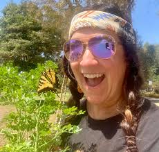 Volunteers clear invasive honeysuckle at nature sanctuary