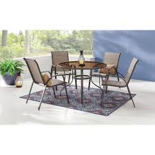 If you love to entertain and love a chic, contemporary finish, these styles may be just what you need to add the right kind of pop to your home. Stylewell 42 In Mix And Match Steel Round Outdoor Patio Dining Table With Painted Glass Fts61191 The Home Depot