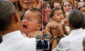 President Obama Soothes Crying Baby During A Stop While En Route To Visit Hiroshima Daily Mail Online