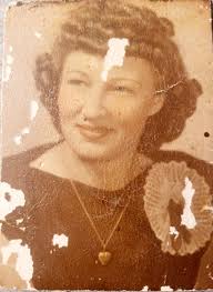 Hi could anyone possibly make this picture of me and my late grandmother  clearer thank you.