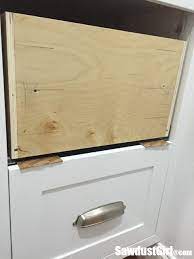 For each door, you'll need two stiles (the vertical parts), two rails (the horizontal parts) and one panel. How To Install Cabinet Drawer Fronts Sawdust Girl