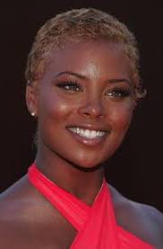 Black Actress With Short Hair Pin On Silk Sheets